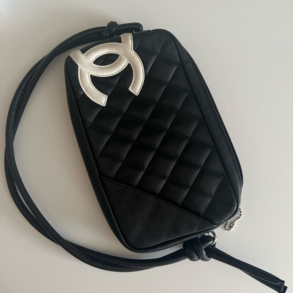 Vintage Chanel lamb skin pochette bag